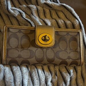 Coach Signature Brown and Tan Clutch
